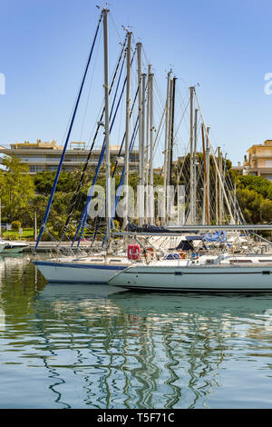 CANNES, FRANCE - APRIL 2019: Yachts lined up in the Port Pierre Canto marina in Cannes. Stock Photo