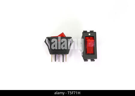 toggle switch Black switches with backlight, on/off - position isolated on white background. High resolution image gallery. Stock Photo