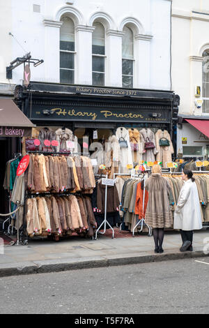 Vintage fur coats outside Hilary Proctor shop along Portobello Road. Notting Hill, West London. UK Stock Photo
