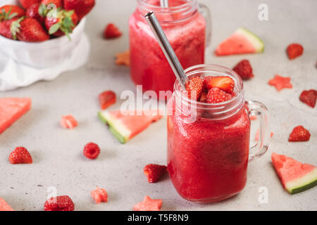 Closeup of red berry fruit smoothie with fresh fruit Stock Photo