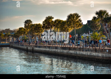 St. Augustine, Florida. January 26 , 2019 . People walking in boardwalk on sunset background in Florida's Historic Coast. Stock Photo