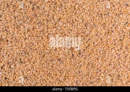 yellow sand background, grains, macro, close up Stock Photo