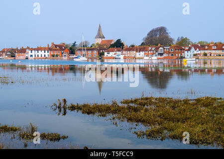 Picturesque old village reflected in still waters of Bosham Creek at high tide in Chichester harbour. Bosham, West Sussex, England, UK, Britain Stock Photo