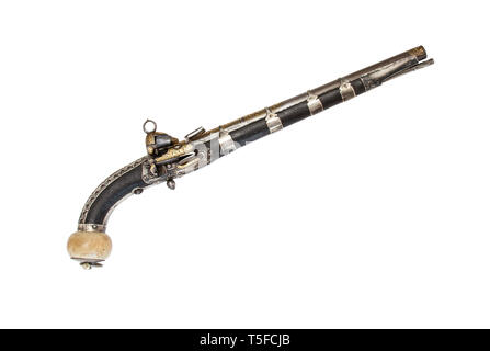 The 19th century Caucasian flintlock pistol with gilded barrel. Stock Photo