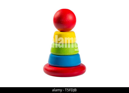 Pyramid build from colored wooden rings. Studio shot on white background. Stock Photo