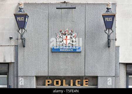 Close up of City of London police station at Bishopsgate with sign & corporation coat of arms crest with two traditional blue police lights England UK Stock Photo