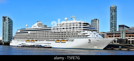 Close up side view of Regent Seven Seas Explorer cruise ship liner docked at cruise terminal in historic Liverpool waterfront Merseyside England UK Stock Photo