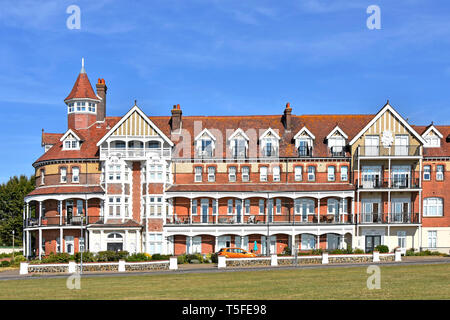 Victorian building now Grand Apartments accommodation at seaside holiday resort was the Grand Hotel on seafront esplanade at Frinton on Sea Essex UK Stock Photo