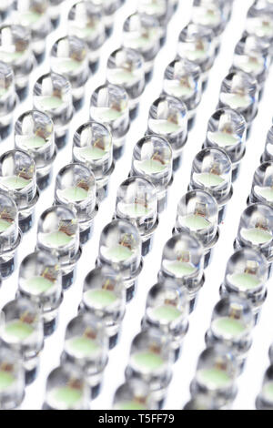 Straight rows of LEDs in the panel close-up macro. Green tint Stock Photo