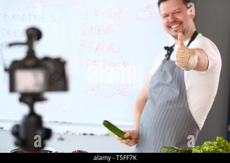 Cheerful Blogger Chef Showing Thumbup Gesture Joke Stock Photo