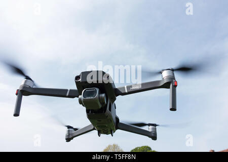 Closeup Looking up at a DJI Mavic 2 PRO personal Drone in flight Stock Photo