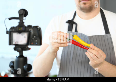 Bearded Blogger Recording Spicy Peppers Chillies Stock Photo
