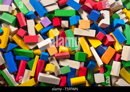 Colorful wooden building blocks background. Children toys. Stock Photo