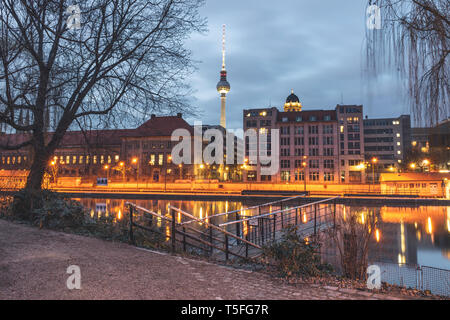Germany, Berlin-Mitte, View from Fischerinsel over Spree river to Berlin TV Tower in the evening Stock Photo