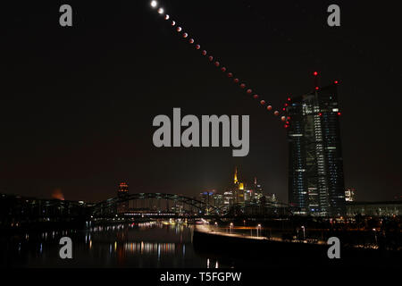 Germany, Frankfurt on Main, composite sequence of total lunar with European Central Bank Stock Photo