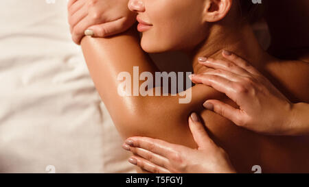 Woman getting classical back and neck massage Stock Photo by Prostock-studio