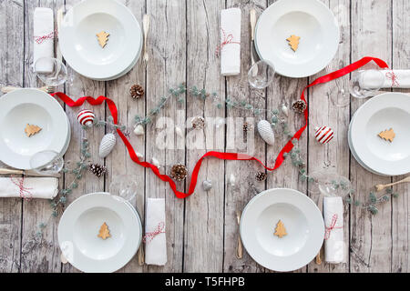Laid table with Christmas decoration Stock Photo