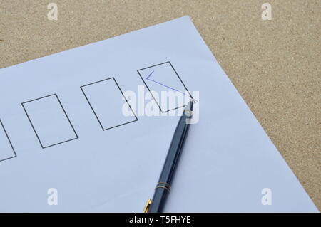 pen filled correct sign in the blank on white paper Stock Photo