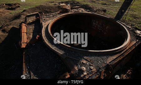 Blasted tank in the war. Caterpillar. Trunk. Stock Photo