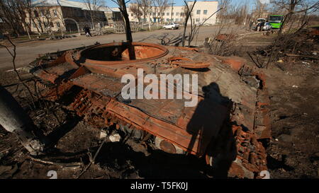 Blasted tank in the war. Caterpillar. Trunk. Stock Photo