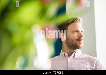 Portrait of bearded man looking away Stock Photo