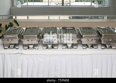 Food Warmers Trays Ready at Buffet Table Stock Photo