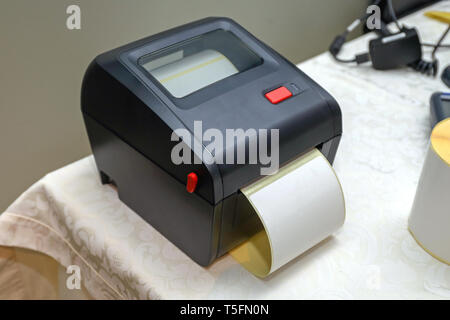 Small Barcode Label Printer Equipment for Distribution Warehouse Stock Photo