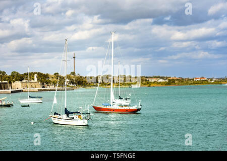 St. Augustine, Florida. January 26 , 2019. Sailboats on light green sea and partial view of Castillo de San Marcos Fort  in Florida's Historic Coast. Stock Photo