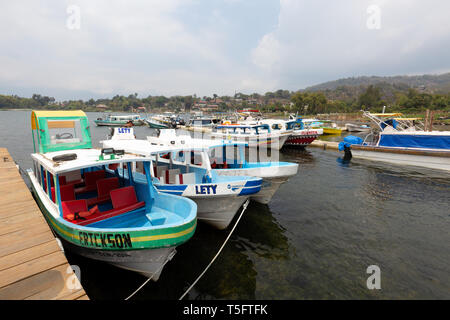 Lake Atitlan Guatemala, colorful boats moored in harbour for lake transport, Santiago Atitlan, Guatemala Central America Stock Photo