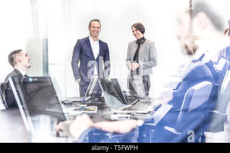 Corporate business team having informal office meeting. Stock Photo