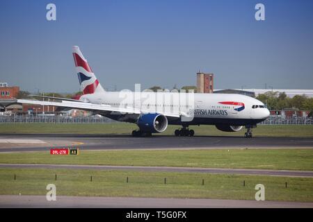 LONDON, UK - APRIL 16, 2014: British Airways Boeing 777 after landing at London Heathrow airport. BA operates fleet of 283 aircraft (largest in the UK Stock Photo