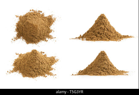 Set of cumin powder pile and texture isolated on white background. Heaps of ground caraway. Stock Photo