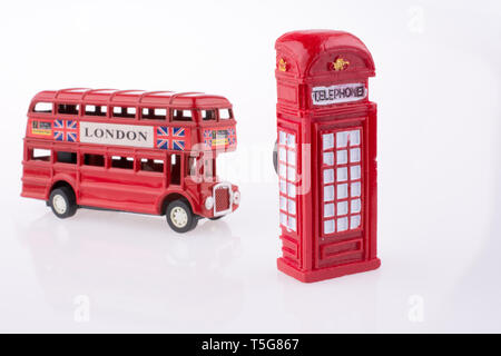 London Bus near a Telephone booth on a white background Stock Photo