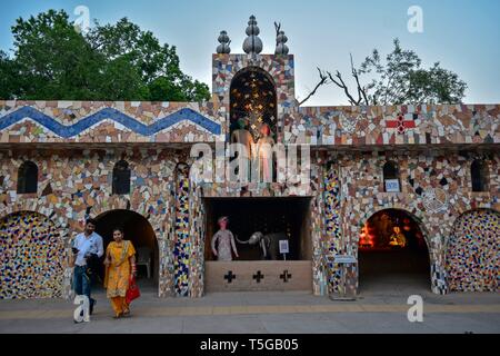 Chandigarh, Chandigarh, India. 24th Apr, 2019. Visitors are seen walking around the asia's largest Rock Garden in Chandigarh.Rock Garden in Chandigarh is a sculptural art garden in India. The 40-acres Rock Garden is built of industrial waste and thrown-away items. Credit: Saqib Majeed/SOPA Images/ZUMA Wire/Alamy Live News Stock Photo