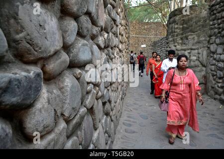 Chandigarh, Chandigarh, India. 24th Apr, 2019. Visitors are seen walking around the asia's largest Rock Garden in Chandigarh.Rock Garden in Chandigarh is a sculptural art garden in India. The 40-acres Rock Garden is built of industrial waste and thrown-away items. Credit: Saqib Majeed/SOPA Images/ZUMA Wire/Alamy Live News Stock Photo