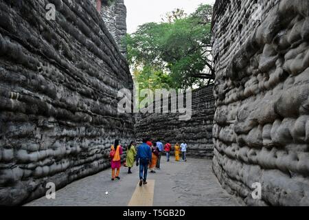 Chandigarh, Chandigarh, India. 24th Apr, 2019. Visitors are seen walking around the asia's largest Rock Garden in Chandigarh.Rock Garden in Chandigarh is a sculptural art garden in India. The 40-acres Rock Garden is built of industrial waste and thrown-away items. Credit: Saqib Majeed/SOPA Images/ZUMA Wire/Alamy Live News Stock Photo