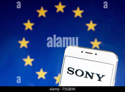 Hong Kong. 21st Apr, 2019. In this photo illustration the Japanese multinational technology conglomerate corporation Sony logo is seen on an Android mobile device with the European Union flag in the background. Credit: Budrul Chukrut/SOPA Images/ZUMA Wire/Alamy Live News Stock Photo