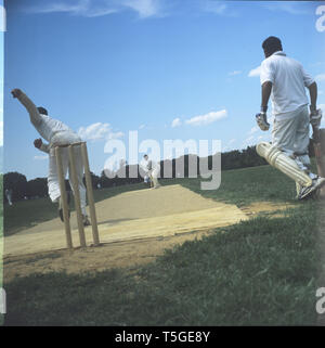 Washington, DC, USA. 19th July, 2003. Men play cricket on the National Mall in Washington, DC, in July 2003. Credit: Bill Putnam/ZUMA Wire/Alamy Live News Stock Photo