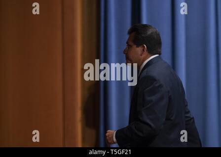 Washington, DC, USA. 27th Aug, 2007. Attorney General Alberto Gonzales walks away from the podium at the Department of Justice media room after announcing his resignation during a press conference at the Department of Justice in Washington, DC, Aug. 27, 2007.Gonzales has been under pressure to resign amid scandals about the firing of eight U.S. attorneys and the government's terrorism survelliance activities.Gonzales was President George W. Bush's attorney general in Texas when Bush was govenor of that state. Credit: Bill Putnam/ZUMA Wire/Alamy Live News Stock Photo