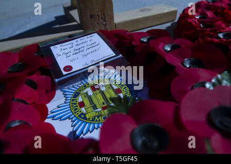 Lashkar Gah, Helmand, Afghanistan. 11th Nov, 2012. Wreaths of poppy are laid at the memorial cross during a British Army Remembrance Day ceremony at the Lashkar Gah Training Center in Helmand province, Afghanistan, Nov. 11, 2012. Credit: Bill Putnam/ZUMA Wire/Alamy Live News Stock Photo