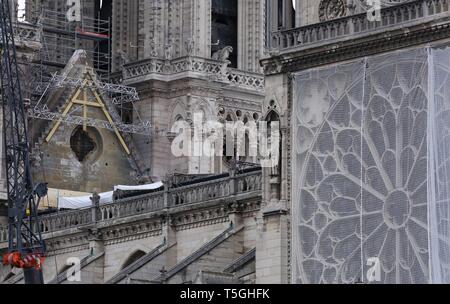 Paris, France. 24th Apr, 2019. Temporary tarpaulins are seen to protect Notre-Dame Cathedral from rain damage in Paris, capital of France, April 24, 2019. Credit: Gao Jing/Xinhua/Alamy Live News Stock Photo