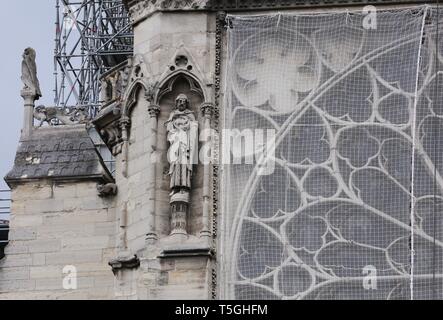 Paris, France. 24th Apr, 2019. Temporary tarpaulins are seen to protect Notre-Dame Cathedral from rain damage in Paris, capital of France, April 24, 2019. Credit: Gao Jing/Xinhua/Alamy Live News Stock Photo