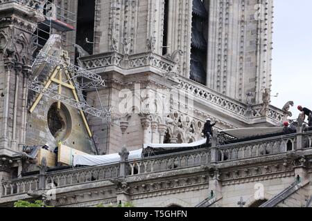 Paris, France. 24th Apr, 2019. Temporary tarpaulins are seen to protect Notre-Dame Cathedral from rain damage in Paris, capital of France, April 24, 2019. Credit: Gao Jing/Xinhua/Alamy Live News Stock Photo