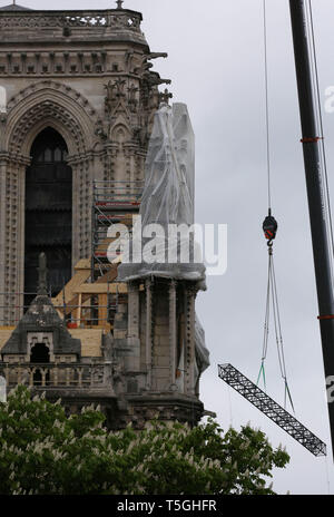 Paris, France. 24th Apr, 2019. Temporary tarpaulins are seen to protect Notre-Dame Cathedral from rain damage in Paris, capital of France, April 24, 2019. Credit: Gao Jing/Xinhua/Alamy Live News Stock Photo