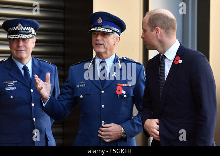 Christchurch, Canterbury, New Zealand. 25th Apr, 2019. New Zealand's Commissioner of Police MIKE BUSH (C) receives Britain's PRINCE WILLIAM at the Justice and Emergency Services Precinct in Christchurch. The Duke of Cambridge is on a two-day visit to New Zealand to commemorate the victims of the Christchurch mosque terror attacks. Credit: New Zealand Government/POOL via ZUMA Wire/ZUMAPRESS.com/Alamy Live News Stock Photo