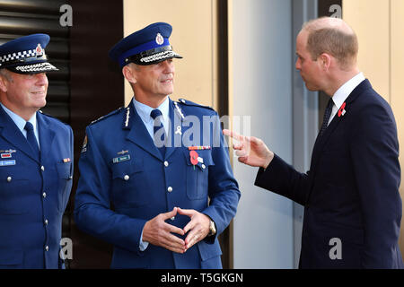 Christchurch, Canterbury, New Zealand. 25th Apr, 2019. New Zealand's Commissioner of Police MIKE BUSH (C) receives Britain's PRINCE WILLIAM at the Justice and Emergency Services Precinct in Christchurch. The Duke of Cambridge is on a two-day visit to New Zealand to commemorate the victims of the Christchurch mosque terror attacks. Credit: New Zealand Government/POOL via ZUMA Wire/ZUMAPRESS.com/Alamy Live News Stock Photo