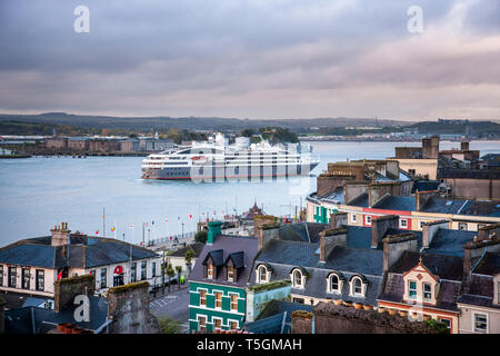 Cobh, Cork, Ireland. 25th April, 2019.  French Cruise ship L'Austral steams up past the town on her way to the deep water quay in Cobh, Co. Cork, Ireland. Credit: David Creedon/Alamy Live News Stock Photo
