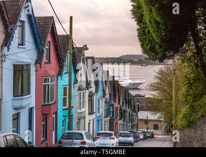 Cobh, Cork, Ireland. 25th April, 2019.  French Cruise ship L'Austral steams up past the Deck of Cards houses on West View towards the deep water quay in Cobh, Co. Cork, Ireland. Credit: David Creedon/Alamy Live News Stock Photo