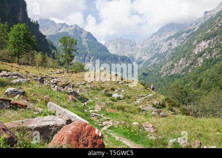 Naked woman at the Valley of Verzasca Ticino Switzerland Stock Photo