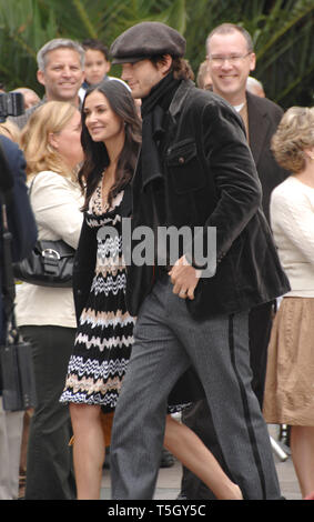 LOS ANGELES, CA. October 16, 2006: ASHTON KUTCHER & DEMI MOORE on Hollywood Boulevard where Bruce Willis was honored with the 2,321st star on the Hollywood Walk of Fame. Picture: Paul Smith / Featureflash Stock Photo